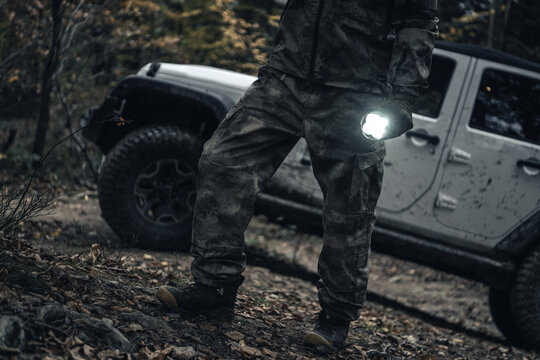 Missing Person Search Crew Member with a Flashlight