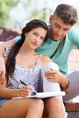 Students, couple and book with woman on stairs with smile, hug and portrait with notes at...
