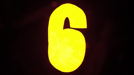 Sign template isolated on black background. Neon yellow six number figure symbol glowing with water waves moving over icon with ripples. - Powered by Adobe