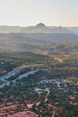 Golden Hour Over Sedona's Bell Rock and Winding Road