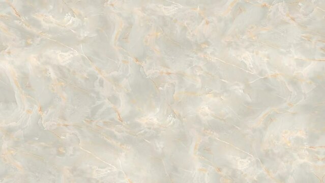 Marble surface visible through the waves of clear water