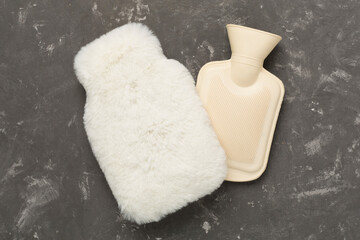 Rubber water warmer bag on concrete background, top view