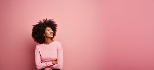 closeup african american girl in profile wearing casual clothes and bottom on pink background