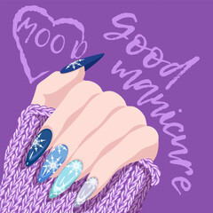 Female hand with winter manicure with snowflakes and a warm knitted sweater isolated on a white background.