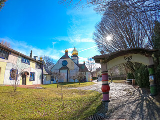 Idyllic church of Saint Barbara designed by architect Friedensreich Hundertwasser, Austria,...