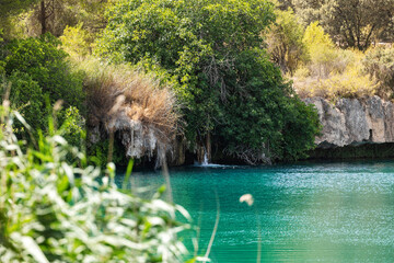 Lagunas de Ruidera located in Albacete Spain, with turquoise waters and blue sky