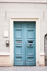 soft blue door on the building