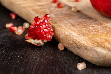 red ripe pomegranate with red grains