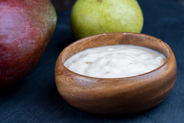 bio yogurt with the addition of fresh mango fruits