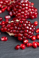 red grains of peeled pomegranate fruit