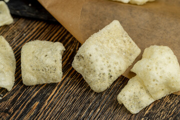crispy potato chips with spices on the table