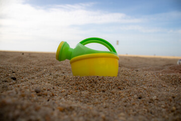 bucket and spade on beach
