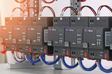 The automation module, controlled via the KNX data bus, is installed in an electrical distribution...