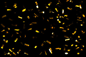 Gold Confetti On A Black Background