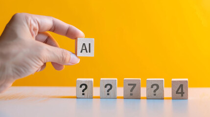 Hand holding a wooden block with AI written on it. Artificial Intelligence background concept on yellow wallpaper