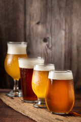 Craft beer. Different glasses of beer on the table.