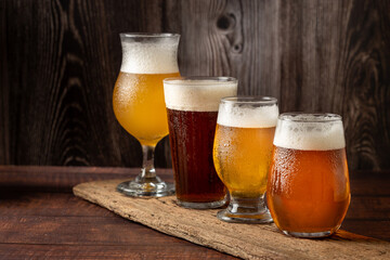 Craft beer. Different glasses of beer on the table.