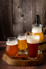 Craft beer. Different glasses of beer on the table.