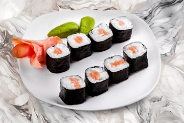 Plate with delicious tasty fresh sushi dish