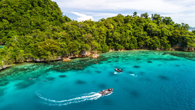 Snorkelling along a coral reef in Fiji's remote Lau Islands