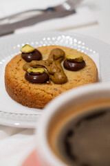 pistachio cookie and cup of coffee, Madrid, Spain