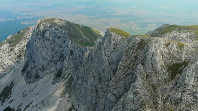 Flying in Durmitor mountains. Durmitor National park in Montenegro. Beautiful aerial mountain landscape, 4k