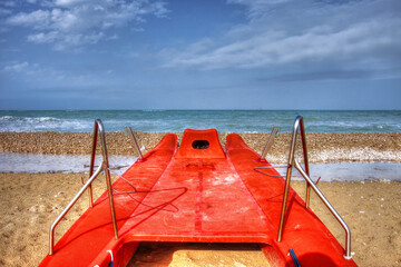 Red rescue boat on the beach of Casalbordino - Abruzzo