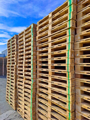 stack of wooden pallets for logistic shipments
