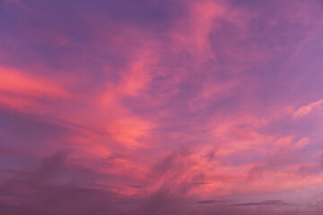 Pink purple violet blue cloudy sky. Beautiful epic sunrise, sunset with cirrus clouds background texture
