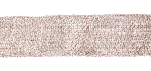 Piece of Mesh Jute Burlap Ribbon on a White Background. Eco-friendly Ribbon made of Natural...