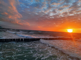 beautiful sunset on the Baltic Sea. Ustronie Morskie, Poland - obrazy, fototapety, plakaty
