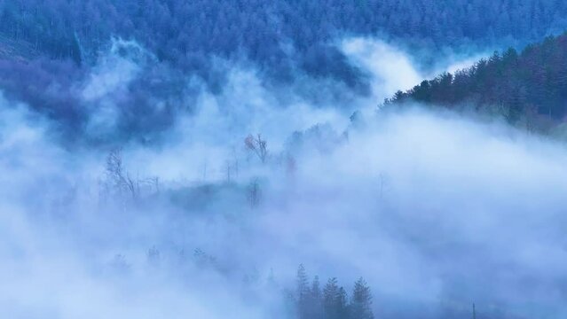 Aerial drone view of the winter landscape around the town of Gainza and Amezqueta and the Txindoki Mountain. Aralar Mountain Range. Goierri region. Gipuzkoa. Basque Country. Spain. Europe