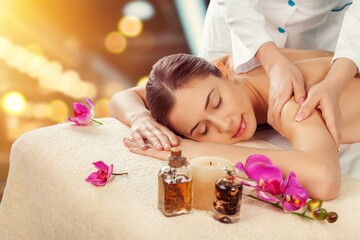 Obraz na płótnie Canvas Relaxation women get service massage in spa salon.
