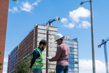 construction workers on site in sunny day