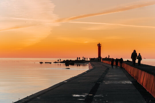 sunset lighthouse on the coast