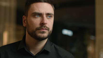 Male portrait concentrated Caucasian man adult businessman look aside think thoughts solve business problem looking distance search watching thoughtful pensive entrepreneur thinking in company office