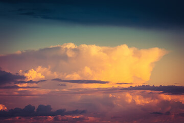 Fototapeta na wymiar Beautiful storm cumulus clouds in the sky during sunrise or sunset, background
