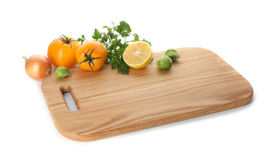 Wooden cutting board with different fresh vegetables isolated on white