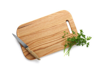 Wooden cutting board with parsley and knife isolated on white, top view