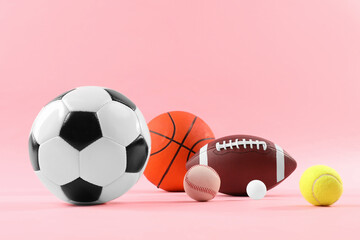 Many different sports balls on pink background, space for text