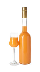 Bottle and glass with tasty tangerine liqueur isolated on white