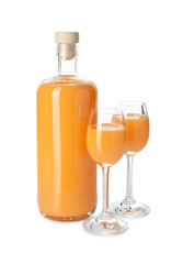 Bottle and glasses with tasty tangerine liqueur isolated on white