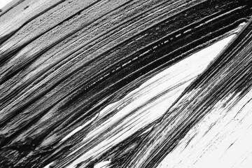 Smear of black mascara isolated on white, top view