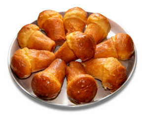 Neapolitan baba rum in round tray isolated