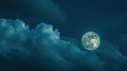 Fototapeta na wymiar a full moon in a cloudy sky with a dark blue sky behind it and a few clouds in the foreground and a dark blue sky with a few white clouds in the foreground.