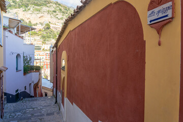 narrow and winding streets characteristic of the town of Positano-Italy.