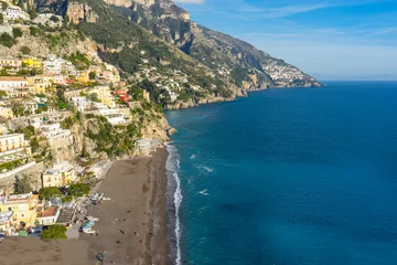 Cercles muraux Plage de Positano, côte amalfitaine, Italie high and winding mountains, beach and sea typical of the town of Positano-Italy