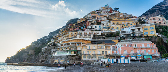 high and winding mountains, beach and sea typical of the town of Positano-Italy - obrazy, fototapety, plakaty