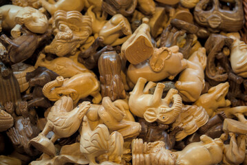 wooden horses ponies lions animals figures figurines pile market, shopping, commerce, sale, dolls,...