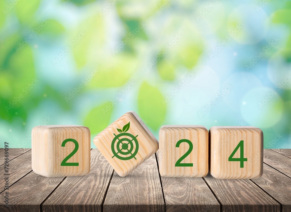 Poster New Year 2024 goal development concept on wooden cubes